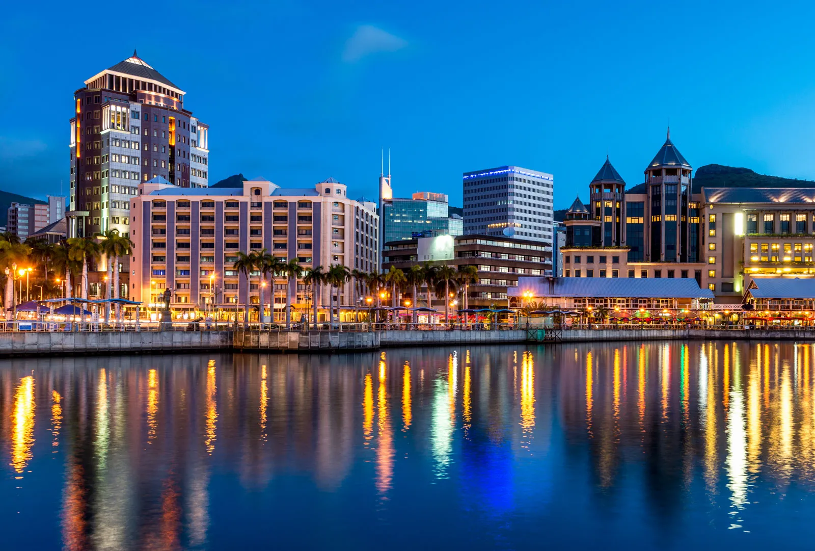 Port Louis — Caudan Waterfront, blue hour reflections — 4K HDR cinematic